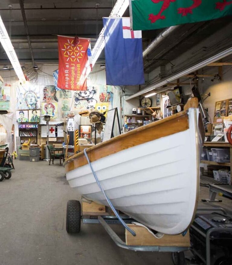 Boats sit at the Village Community boathouse ready to head into the water