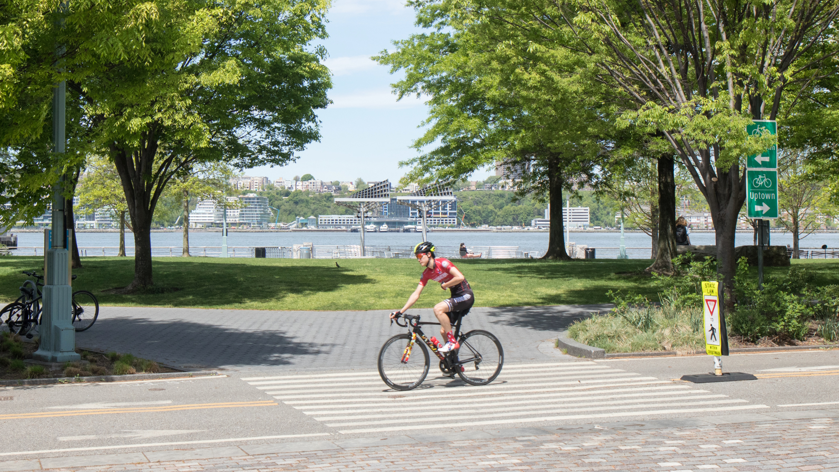 A cyclist continues down the bikeway