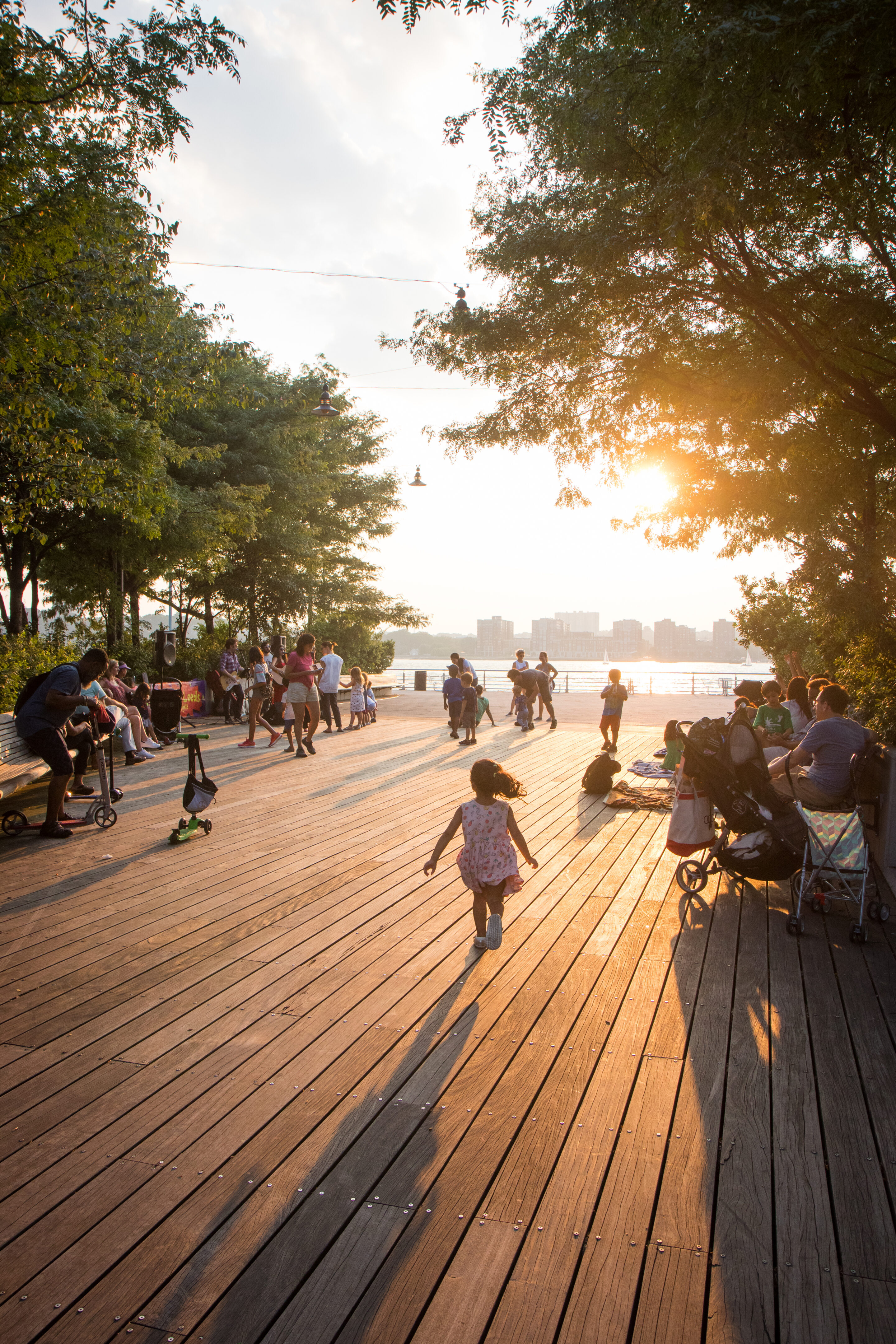 Park visitors enjoy the Pier as the sun sets