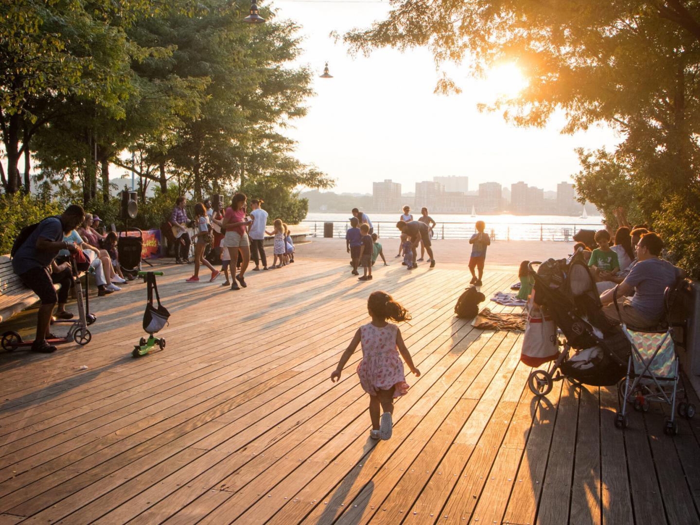 Park visitors enjoy the Pier as the sun sets