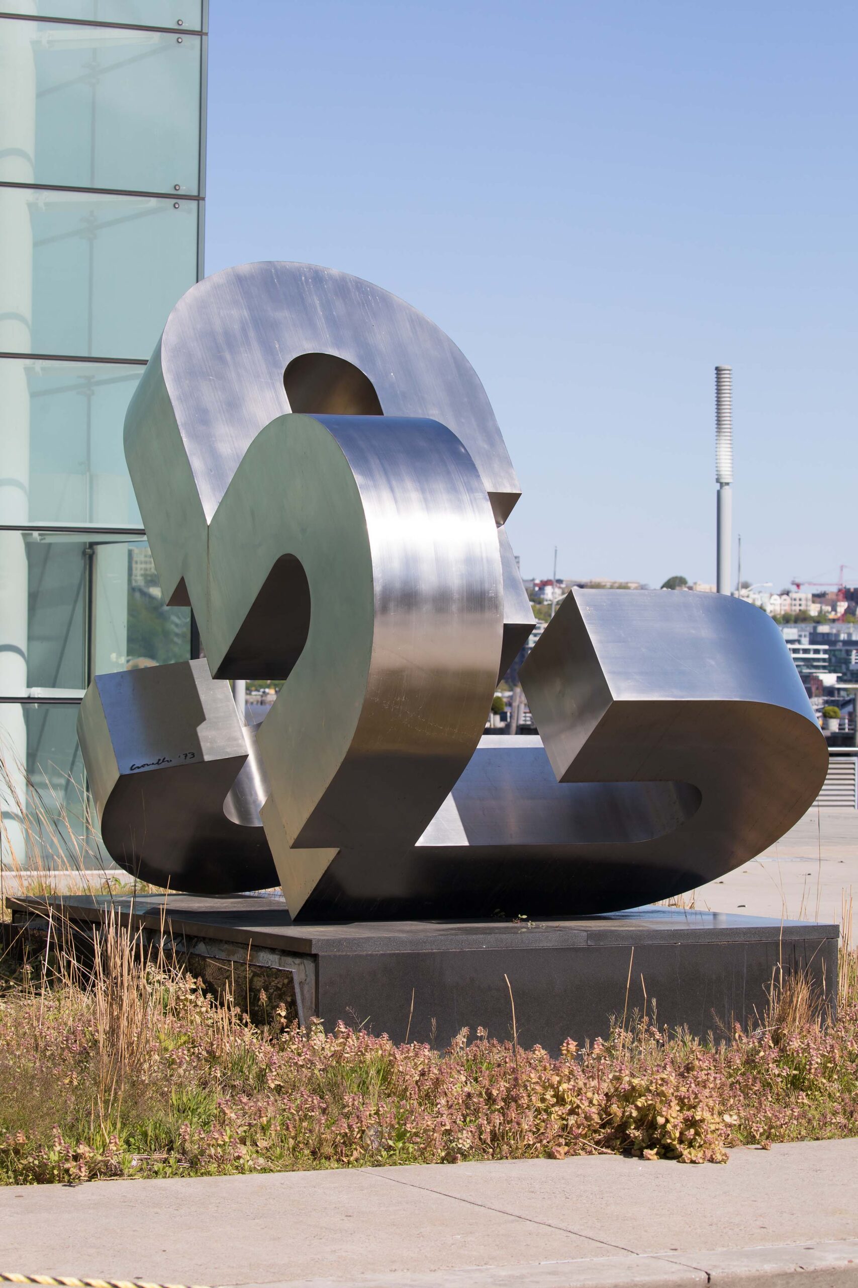 The art piece SENES sits on Pier 79, a steel structure with round edges connected to each other