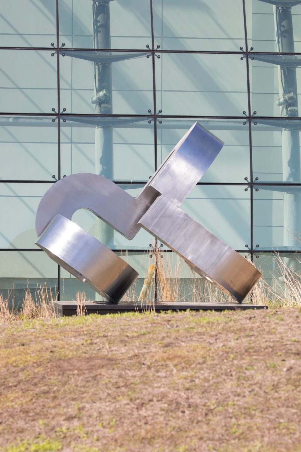 The art piece SENES sits on Pier 79, a steel structure with round edges connected to each other