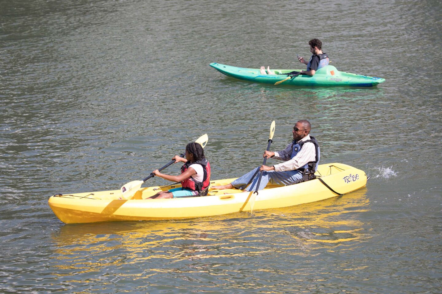 Park visitors enjoy drifting along the Hudson River in their kayaks