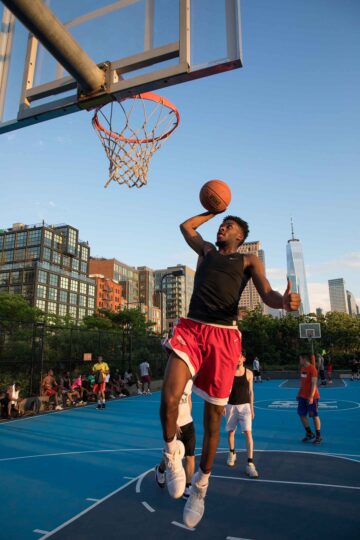A slam dunk into the hoop in Hudson River Park