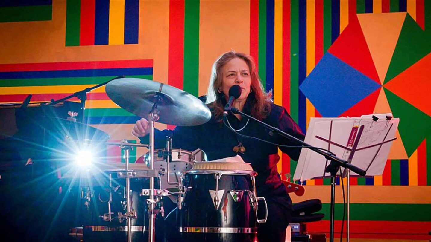 Annet A Aguilar plays the drums during a concert