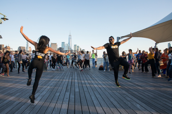 Dancing at Sunset Salsa during a Summer of Fun event in Hudson River Park