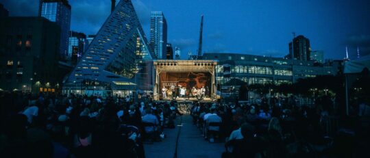 The night is a darkish blue with Blues BBQ blasting out tunes to the public