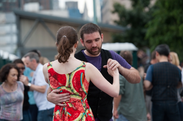 A couple enjoys a slower dance at Blues BBQ in Hudson River Park