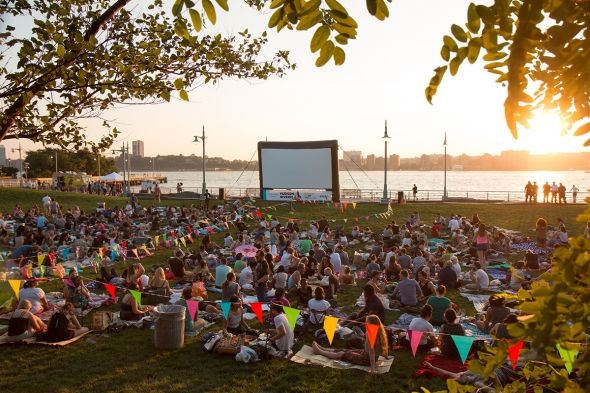 The large crowd waits patiently on the lawn at Pier 63 for the movie to begin