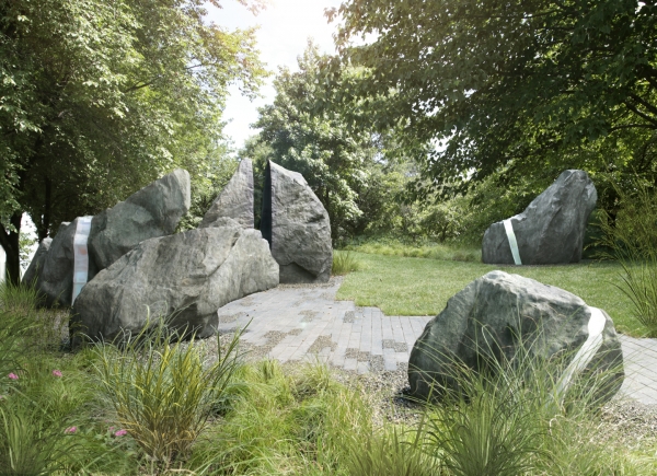 The LGBT Memorial, boulders fabricated in bronze with some featuring refractory glass