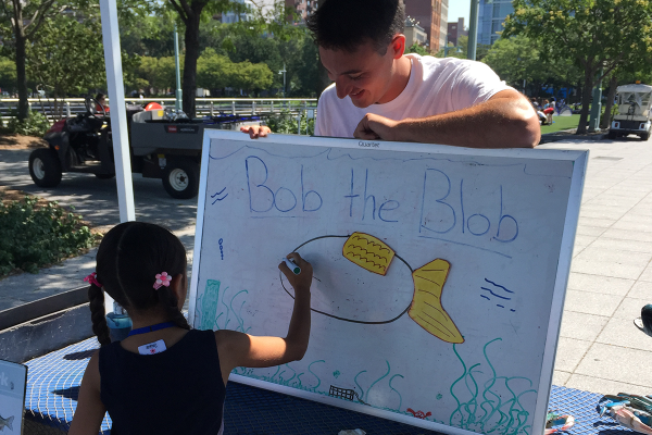 Child painting Bob the Blob as part of HRPK's STEM of the Week activity program
