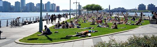 Park visitors enjoy sunbathing at Pier 45