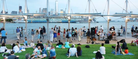 Park visitors enjoy an evening at Sunset on the Hudson in Hudson River Park