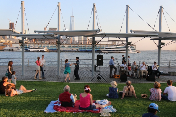 A crowd gathers on Pier 45 for Sunset on the Hudson in Hudson River Park