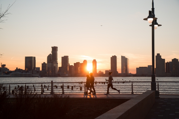 Sunset fuels the joggers who head down the esplanade