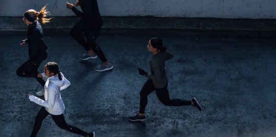 Runners head down the path in Hudson River Park