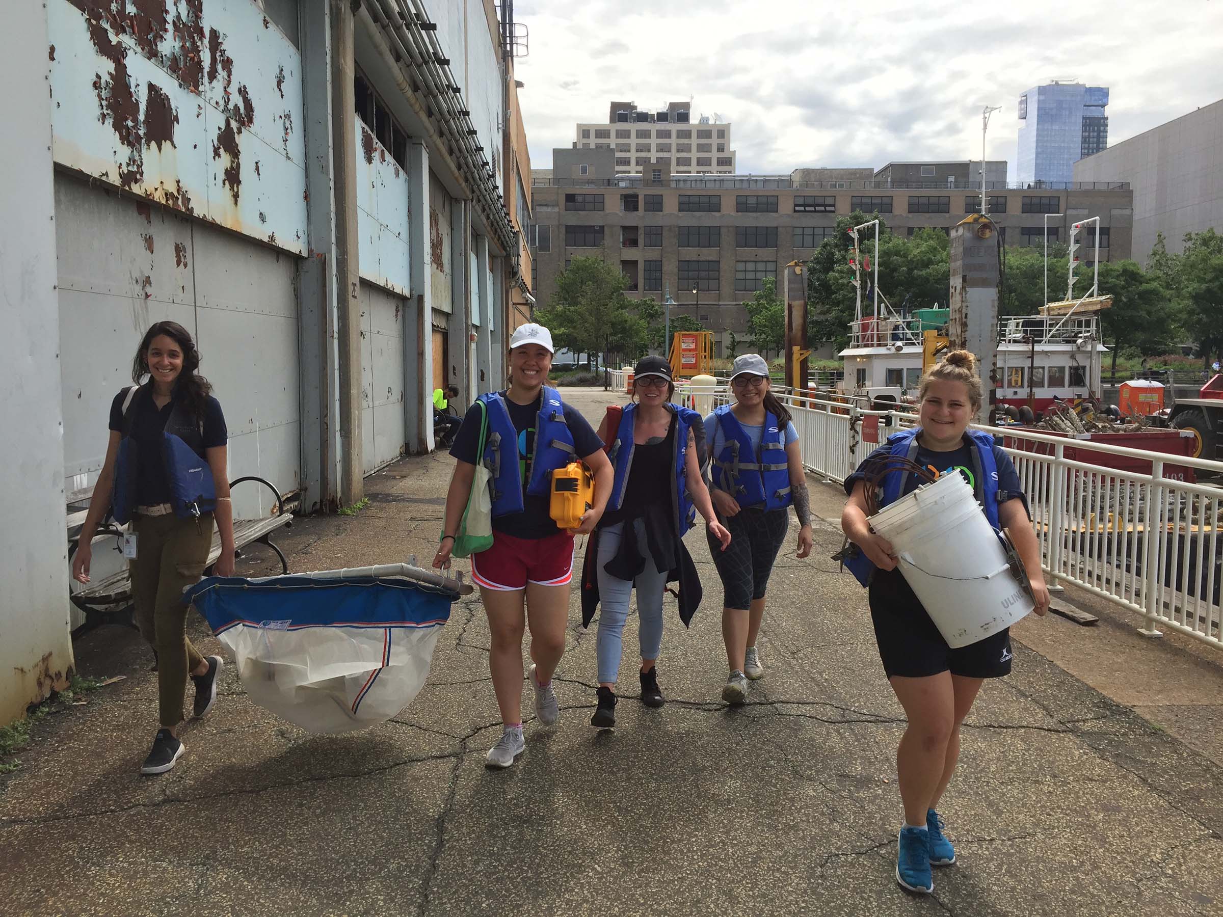 A group of scientiest prepare to go in search of microplastics in the river