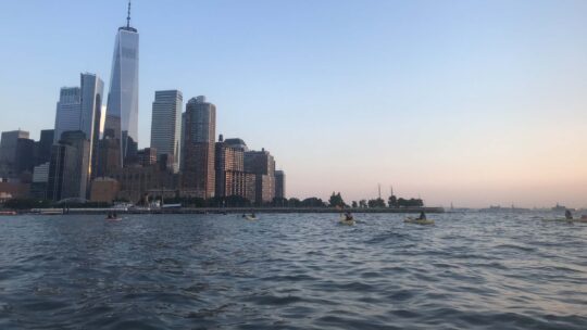 The Hudson River with kayakers floating around