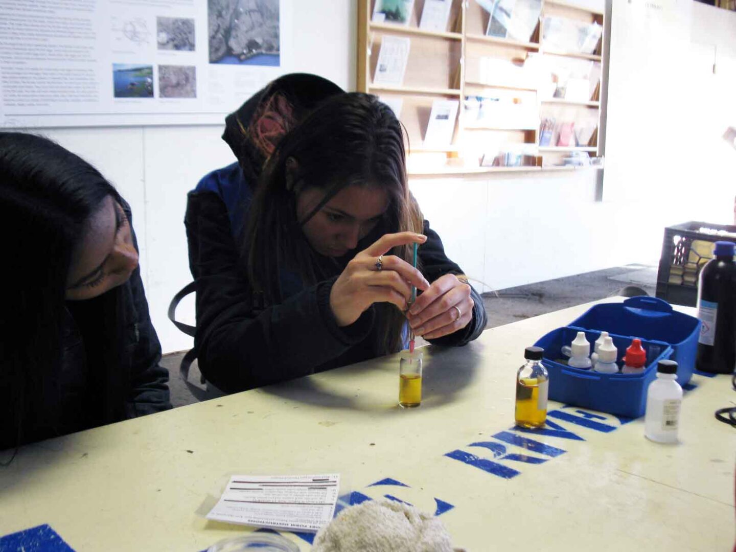 Students learn about water quality and drop in solution to test their theories