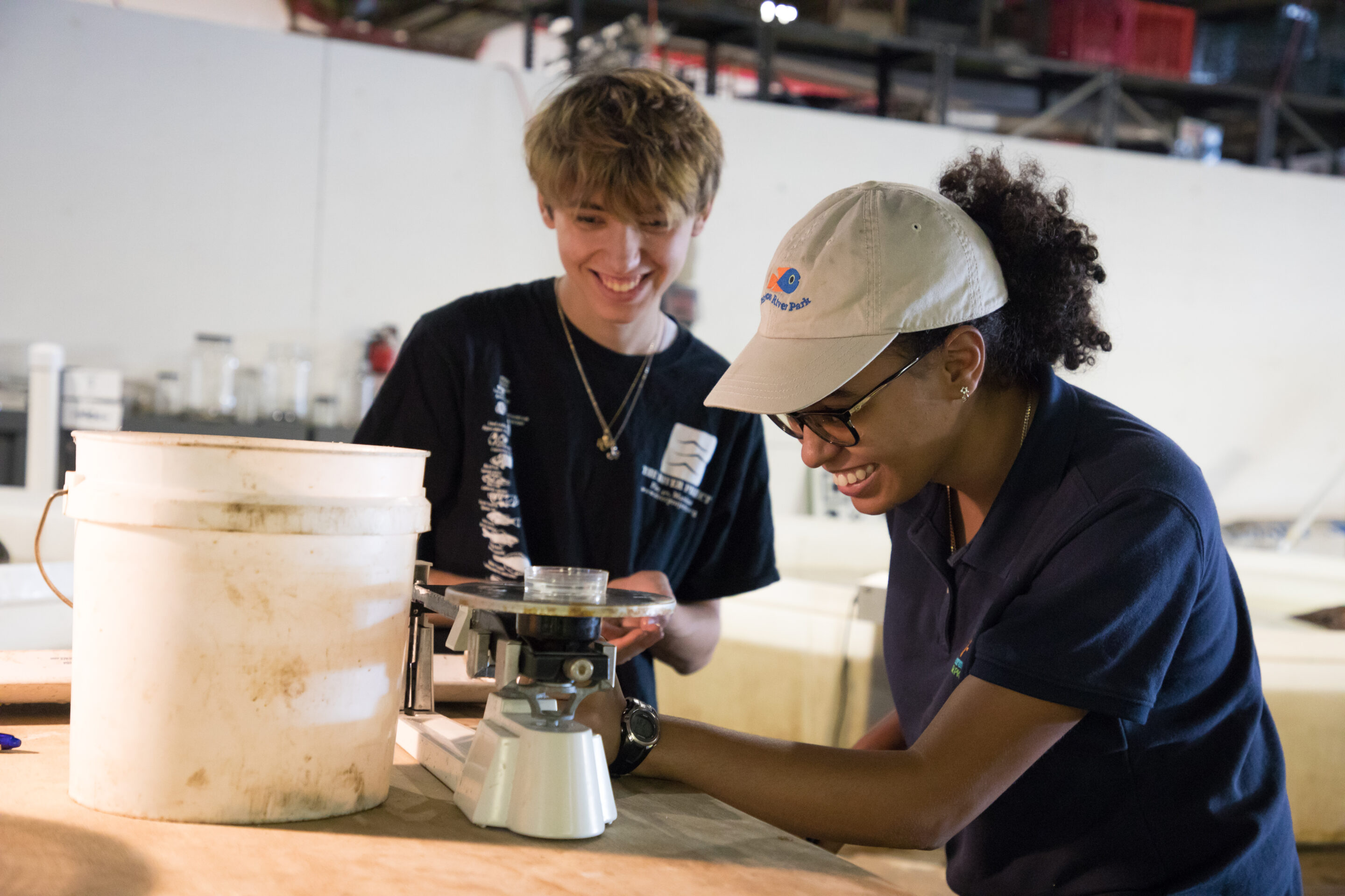 Two happy scientists smiling at what they've discovered