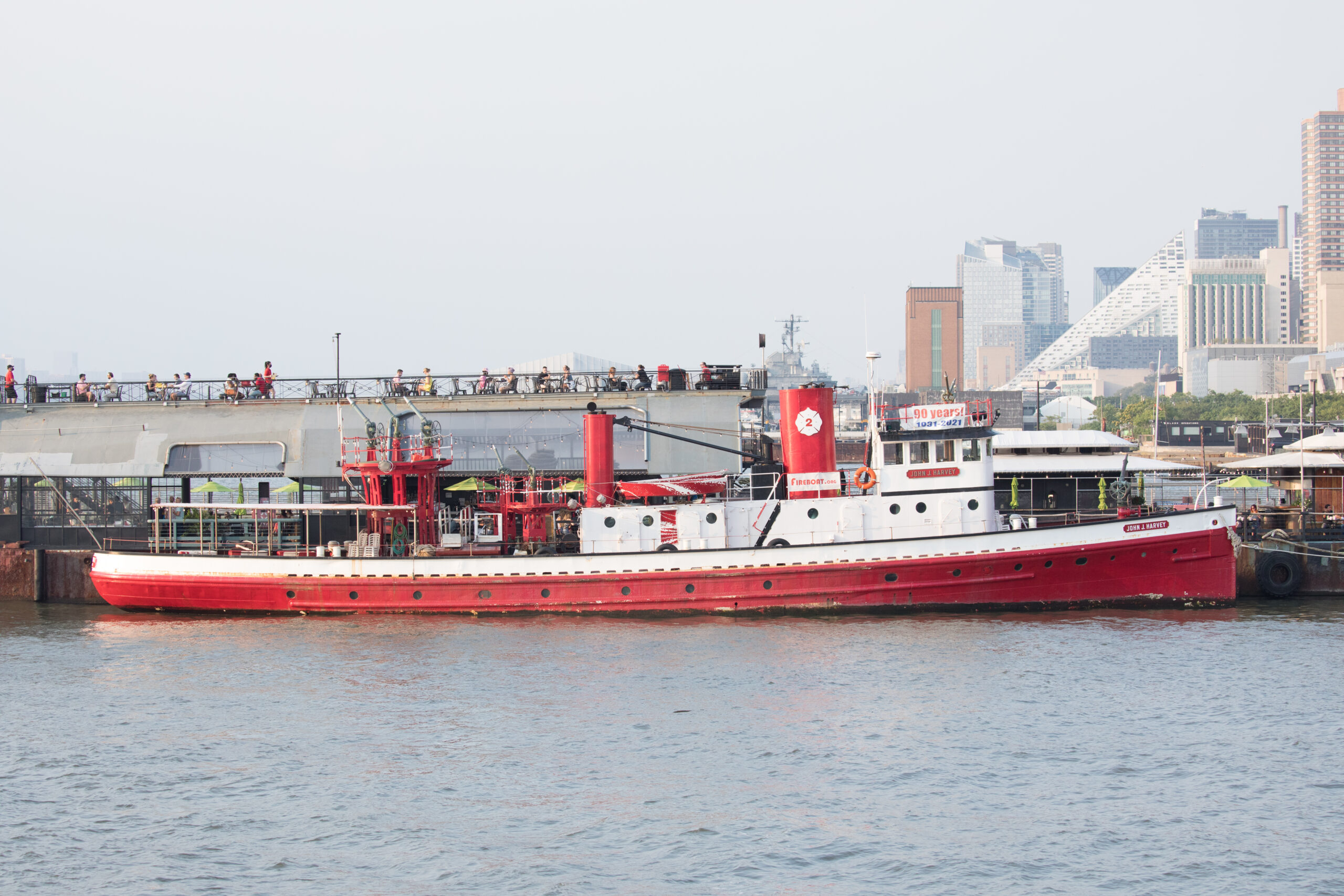 The privately owned John J. Harvey boat docked at Hudson River Park's Pier 66