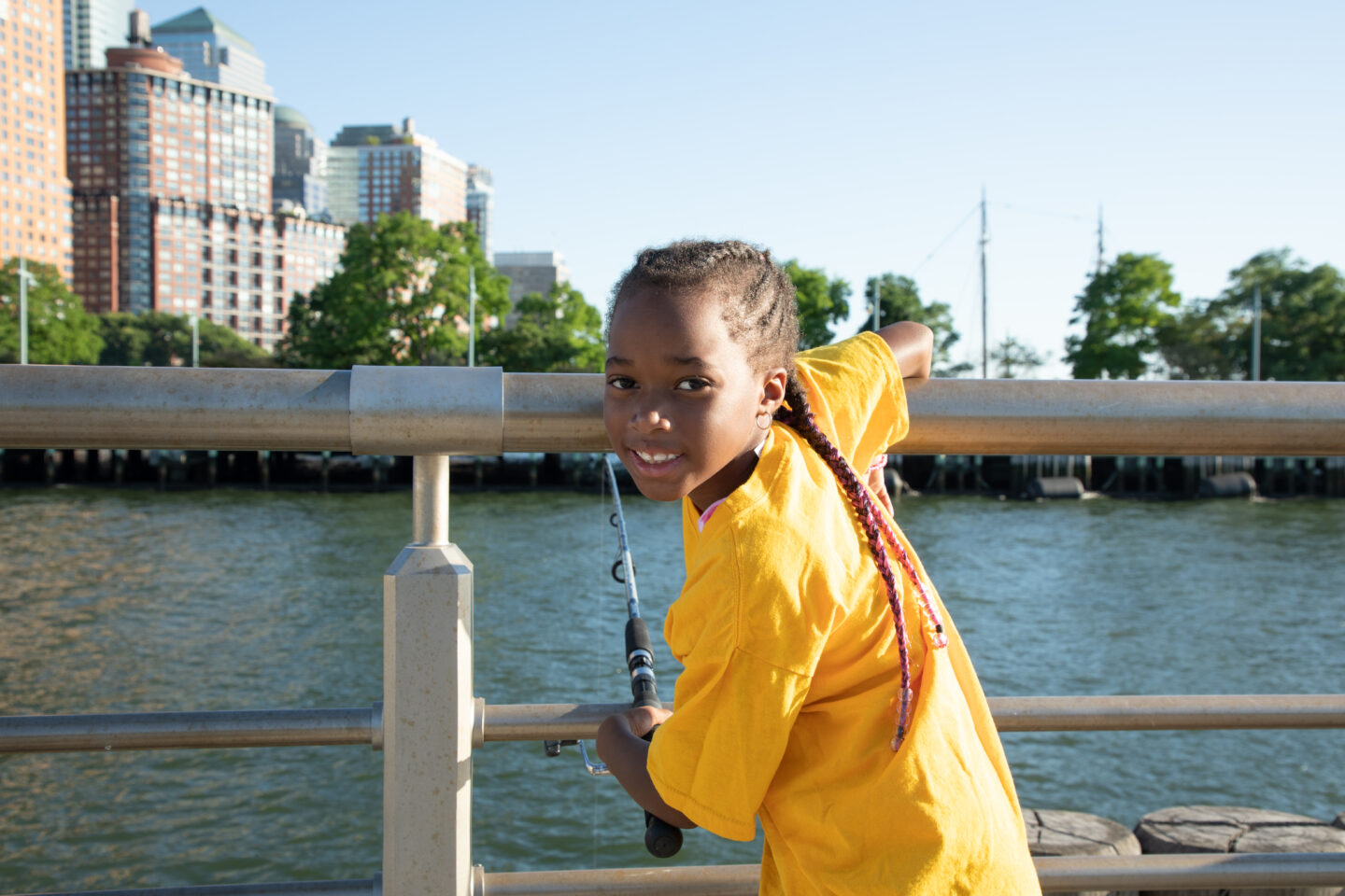 girl in yellow tshirt big city fishing