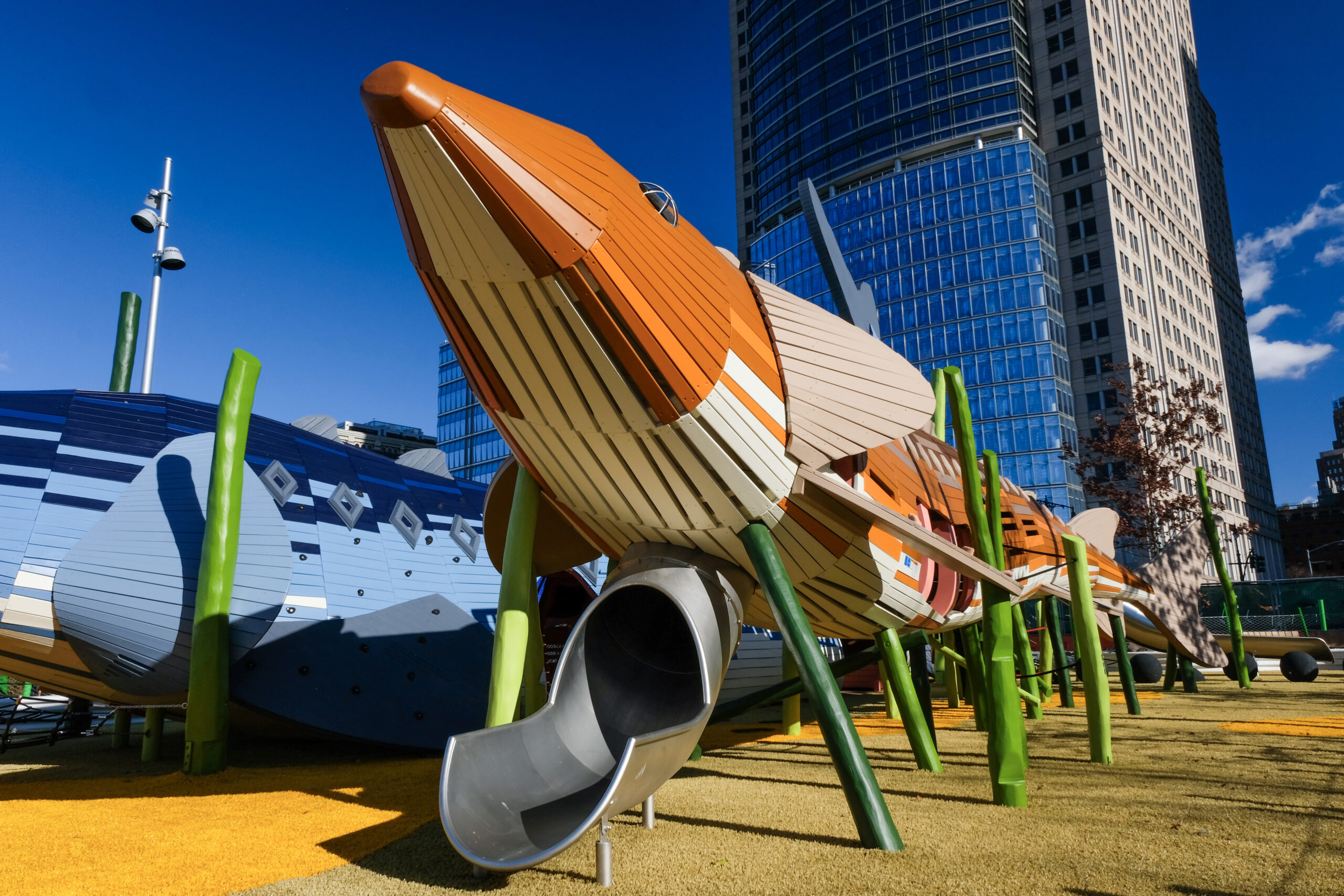 A playground structure shaped like a sturgeon with a slide coming out of its front at the Pier 26 Science Playground