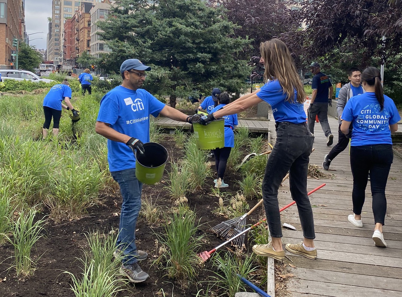 Citi volunteers beautify the Tribeca Boardwalk in Hudson RIver Park