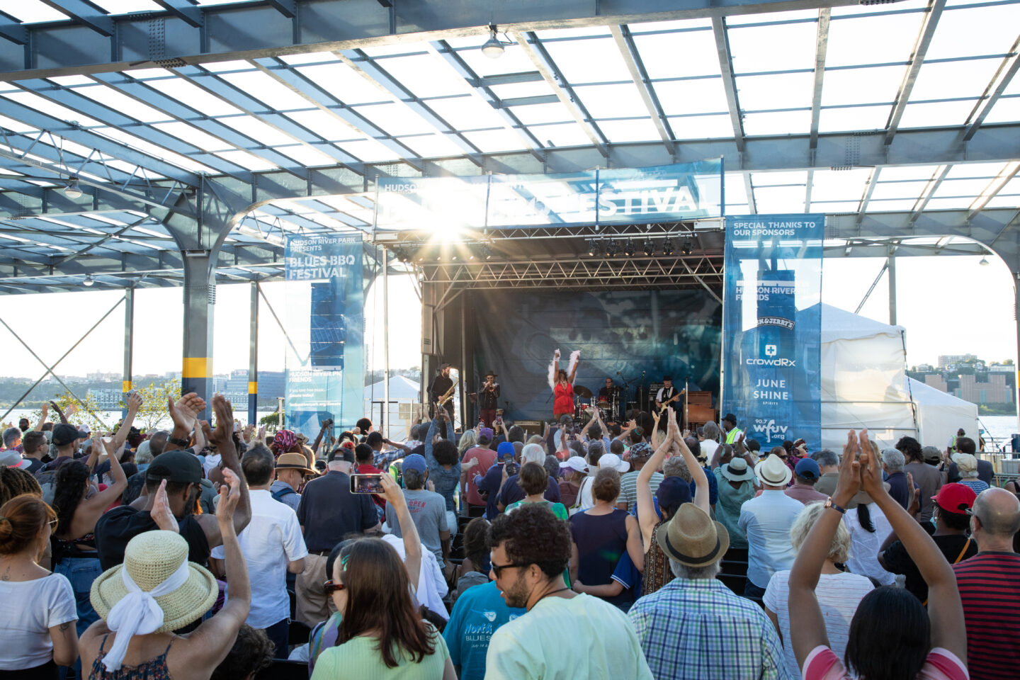 Blues BBQ crowd cheers on performer at Pier 76