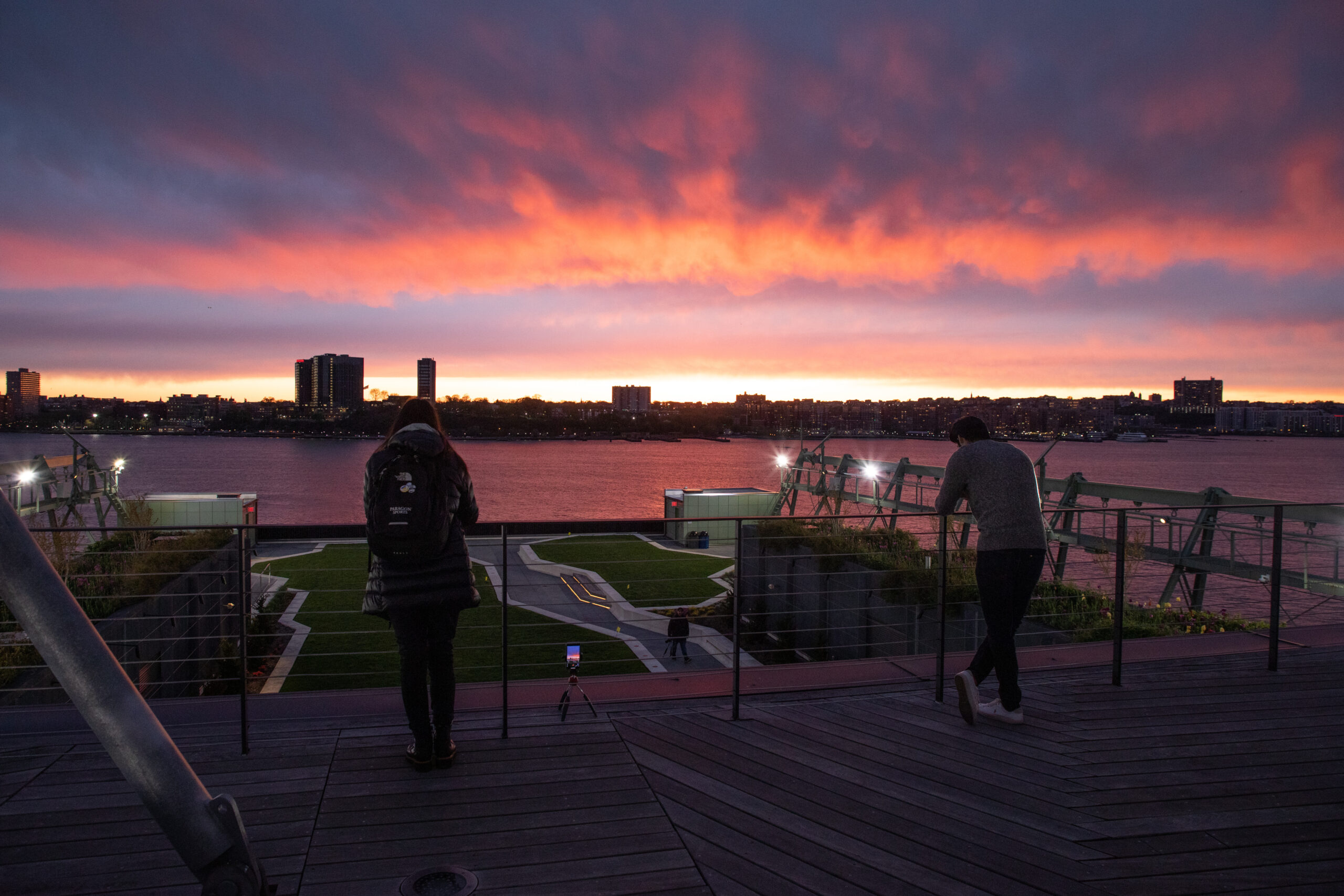 A sunset view of the Hudson River from the Pier 57 Rooftop Park