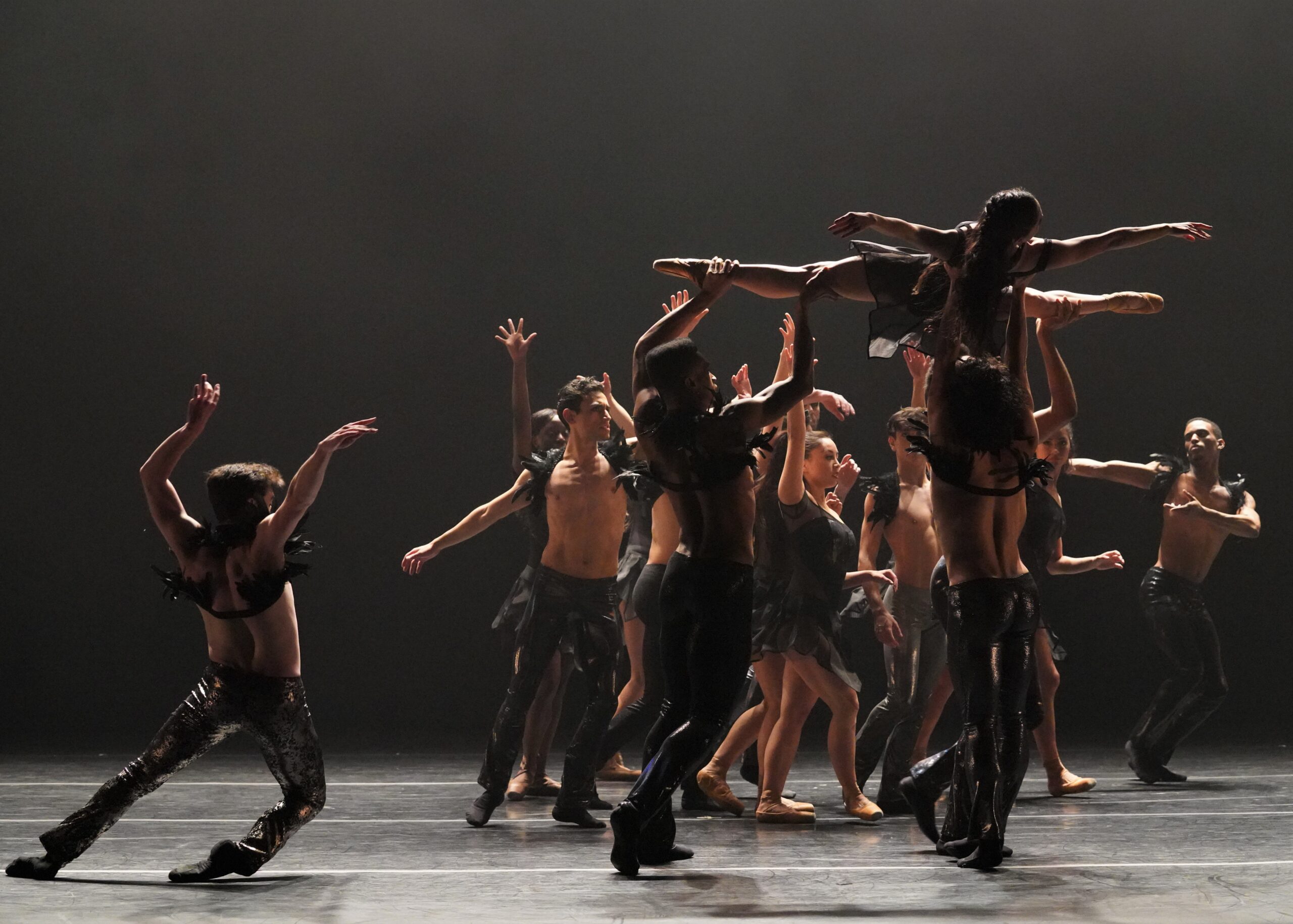 Performers from Complexions Contemporary Ballet dancing in an on-stage performance