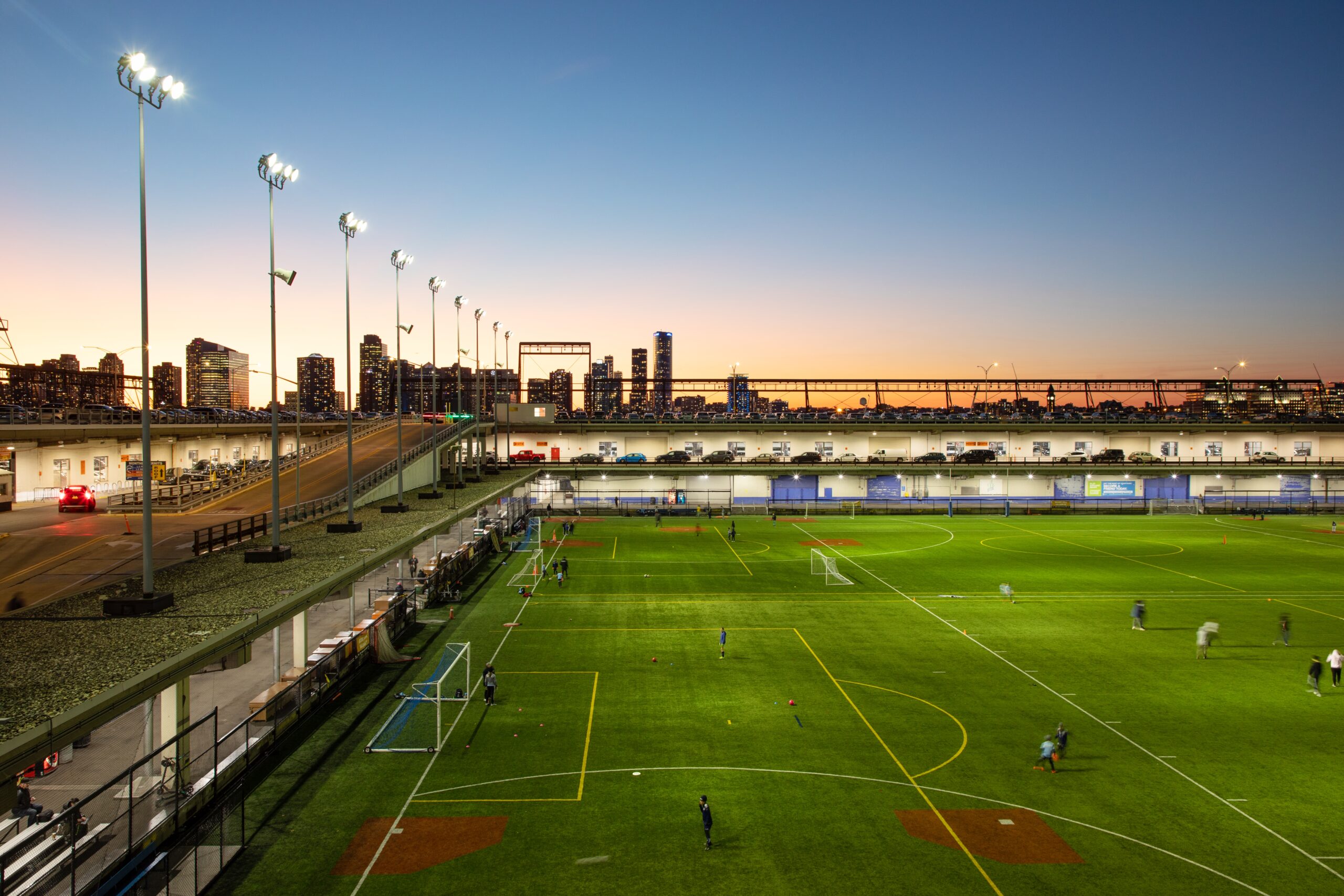 The Pier 40 courtyard athletic fields at sunset