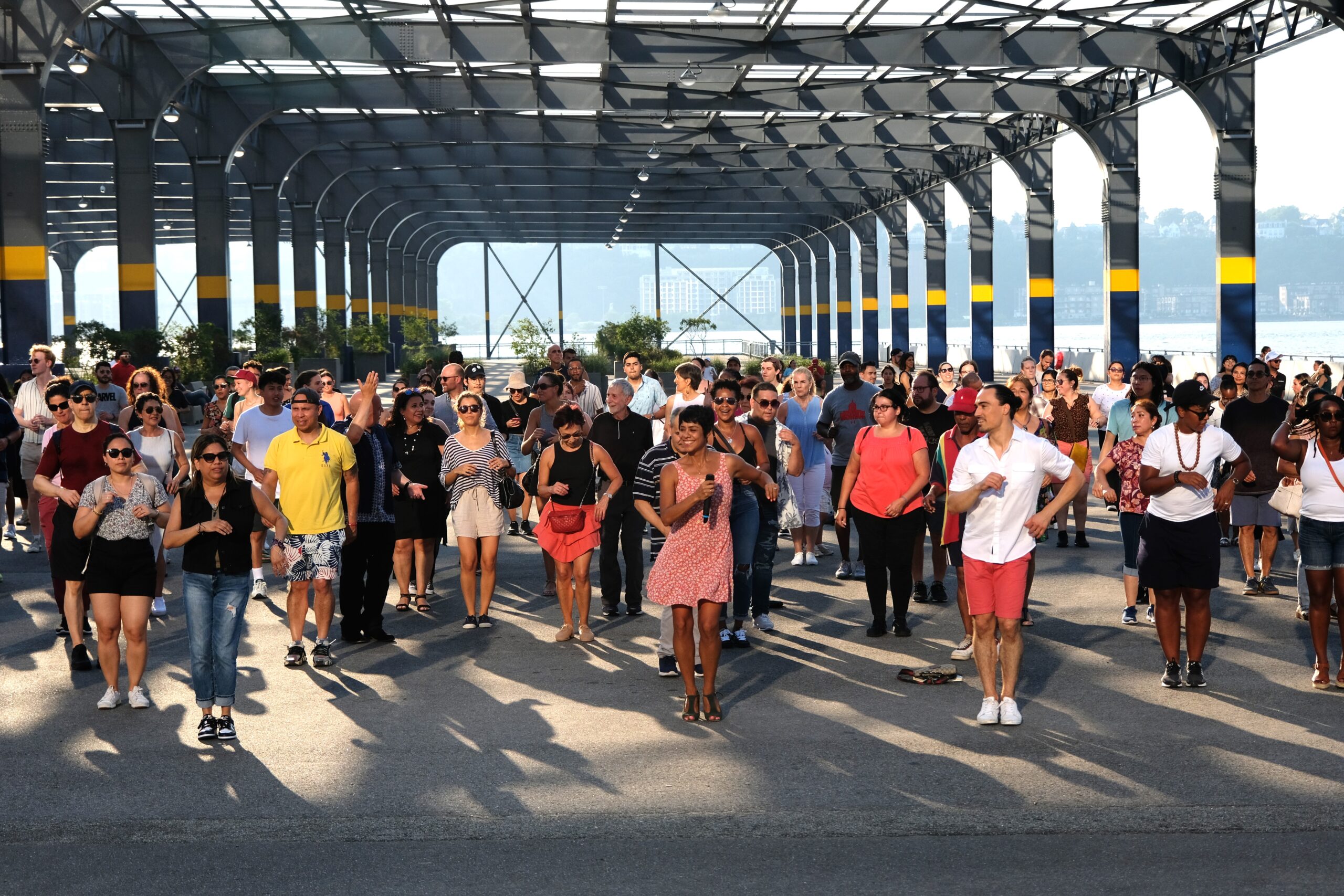 People dancing at a Sunset Salsa class on Pier 76.