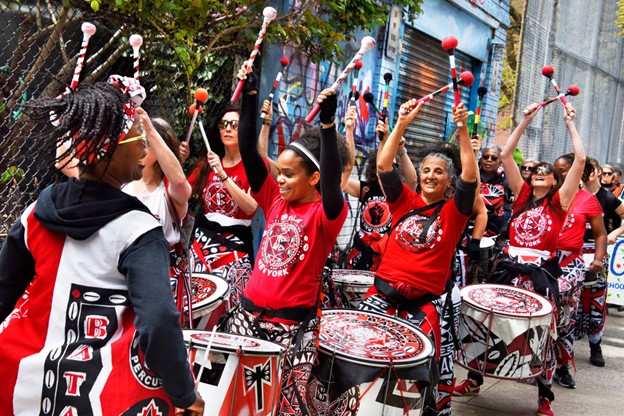 Drummers from Batalà New York perform during a parade