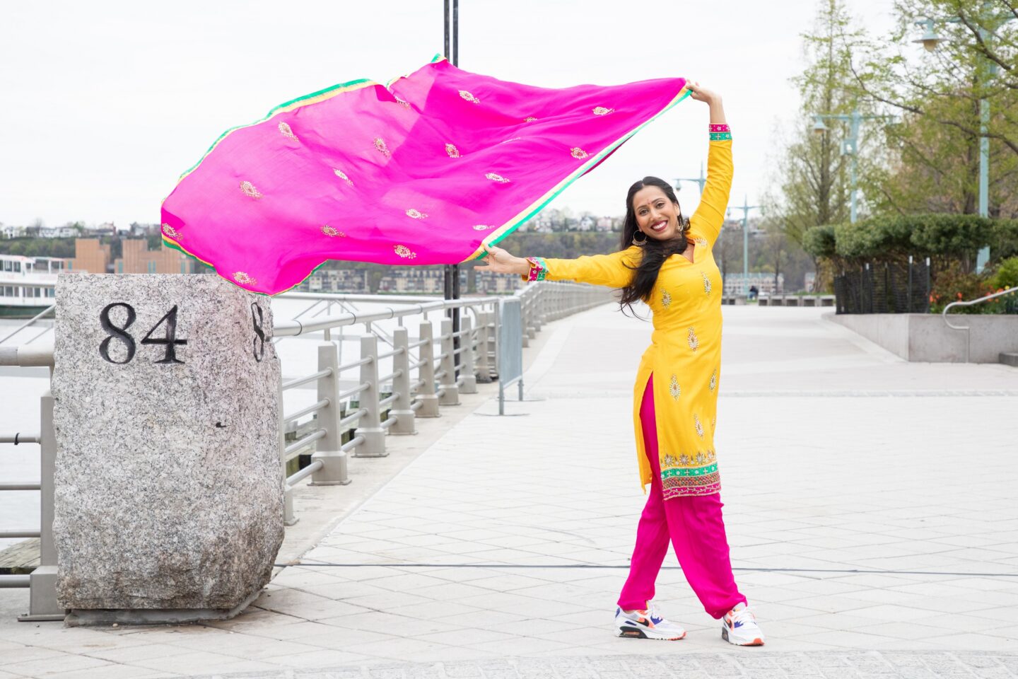 A dancer from Ajna Dance Company poses on the Hudson River Park esplanade near Pier 84