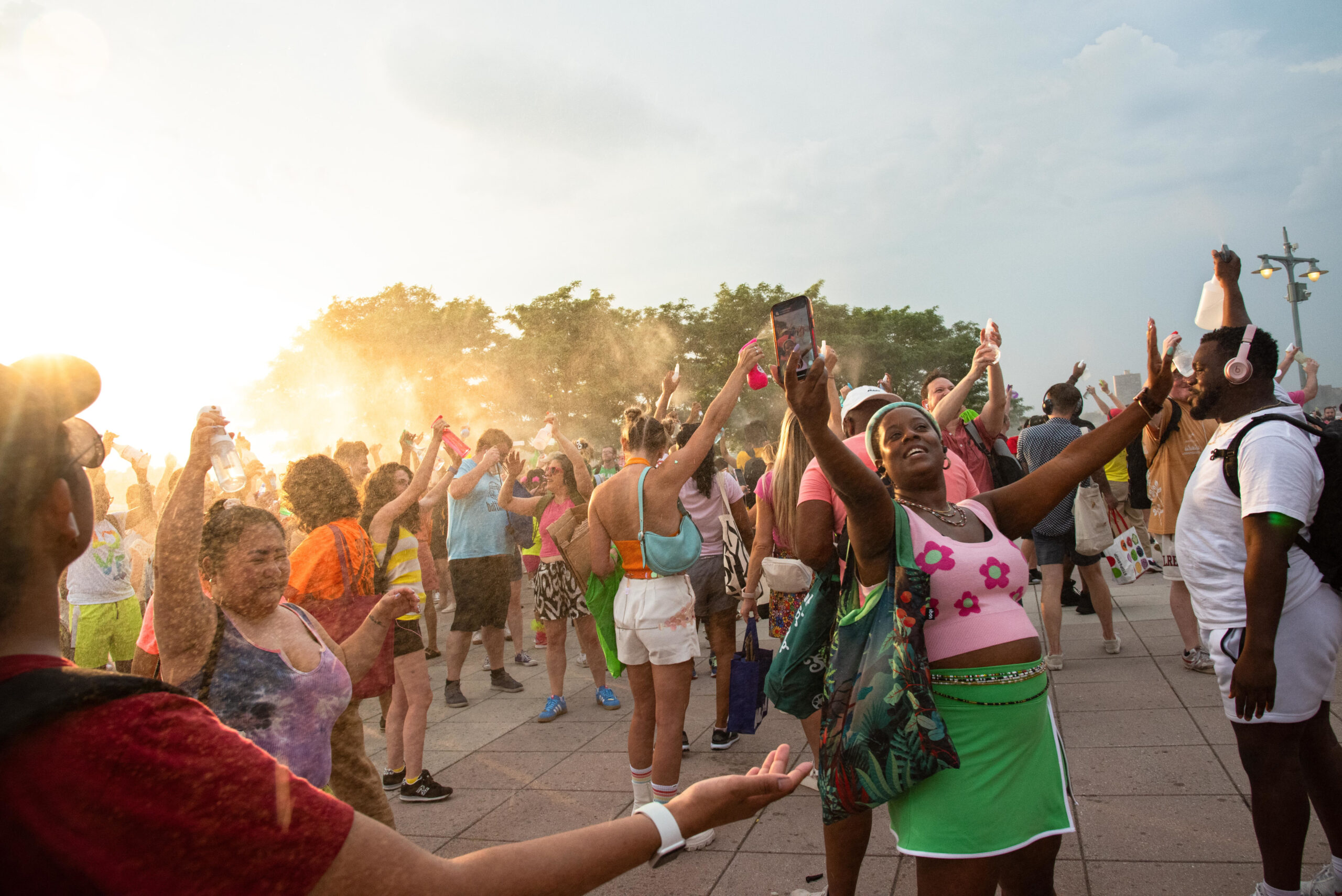 A group of people dancing at an event at Pier 84