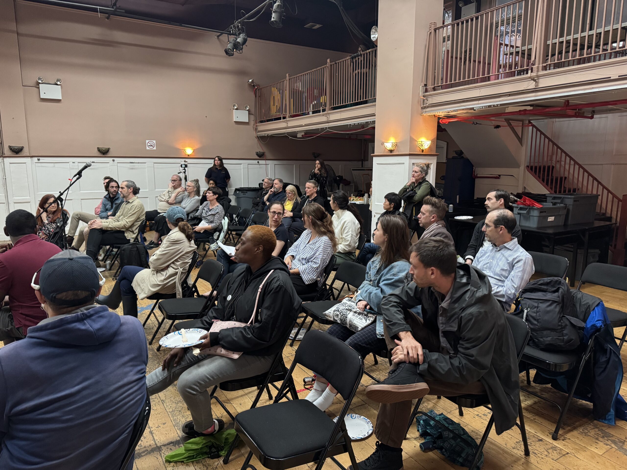 Members of the audience ask questions to the presenters at a W 29–W 44 Esplanade & Landscape Engagement Meeting