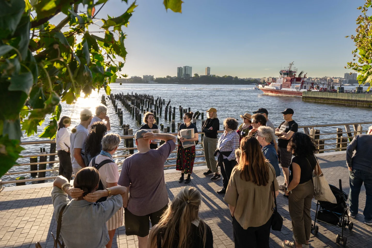 HRPK River Project staffers lead a group on a Shoreline Stroll tour at Gansevoort Peninsula