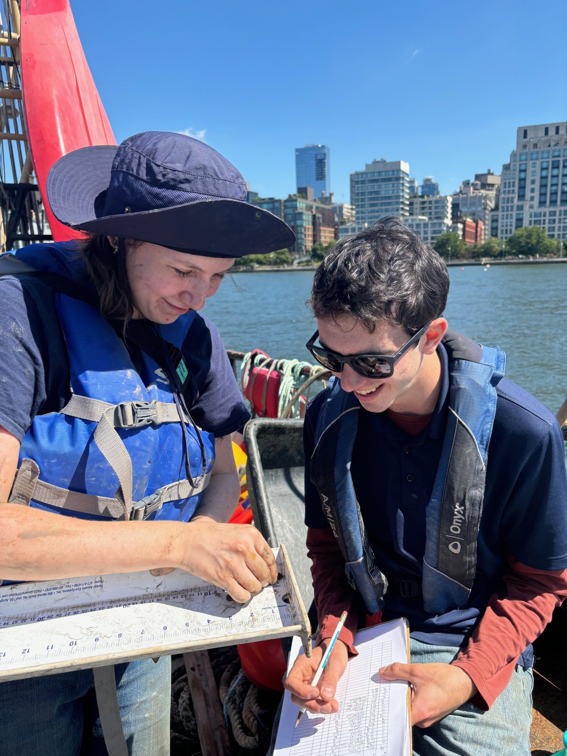 Researchers record findings from a reef ball inspection