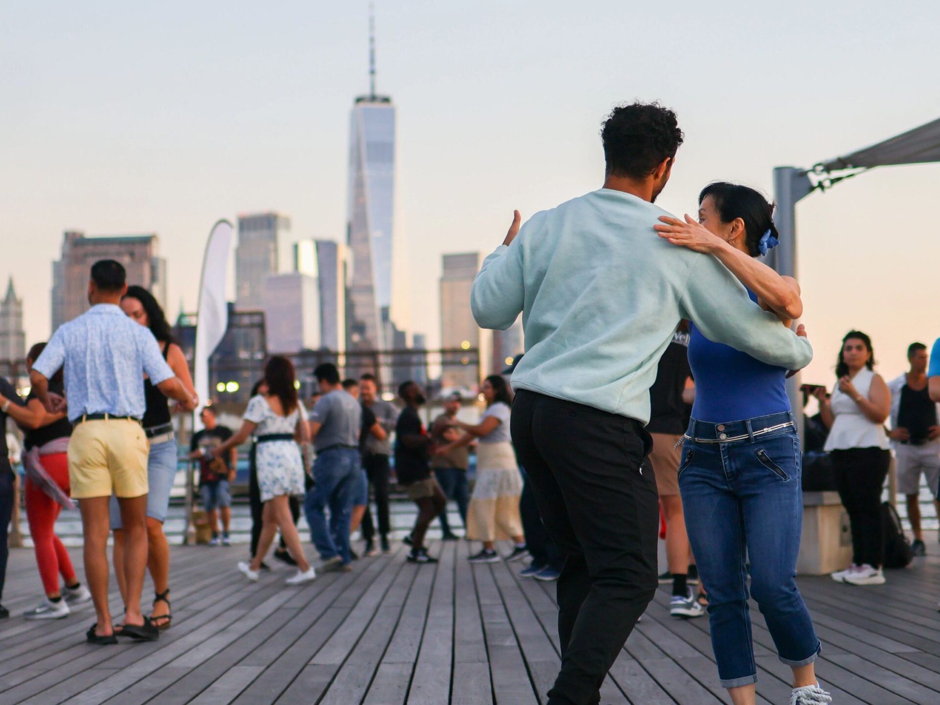 People dancing at Pier 45 during a Sunset Salsa event