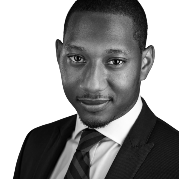 Professional headshot of Ian Belizaire