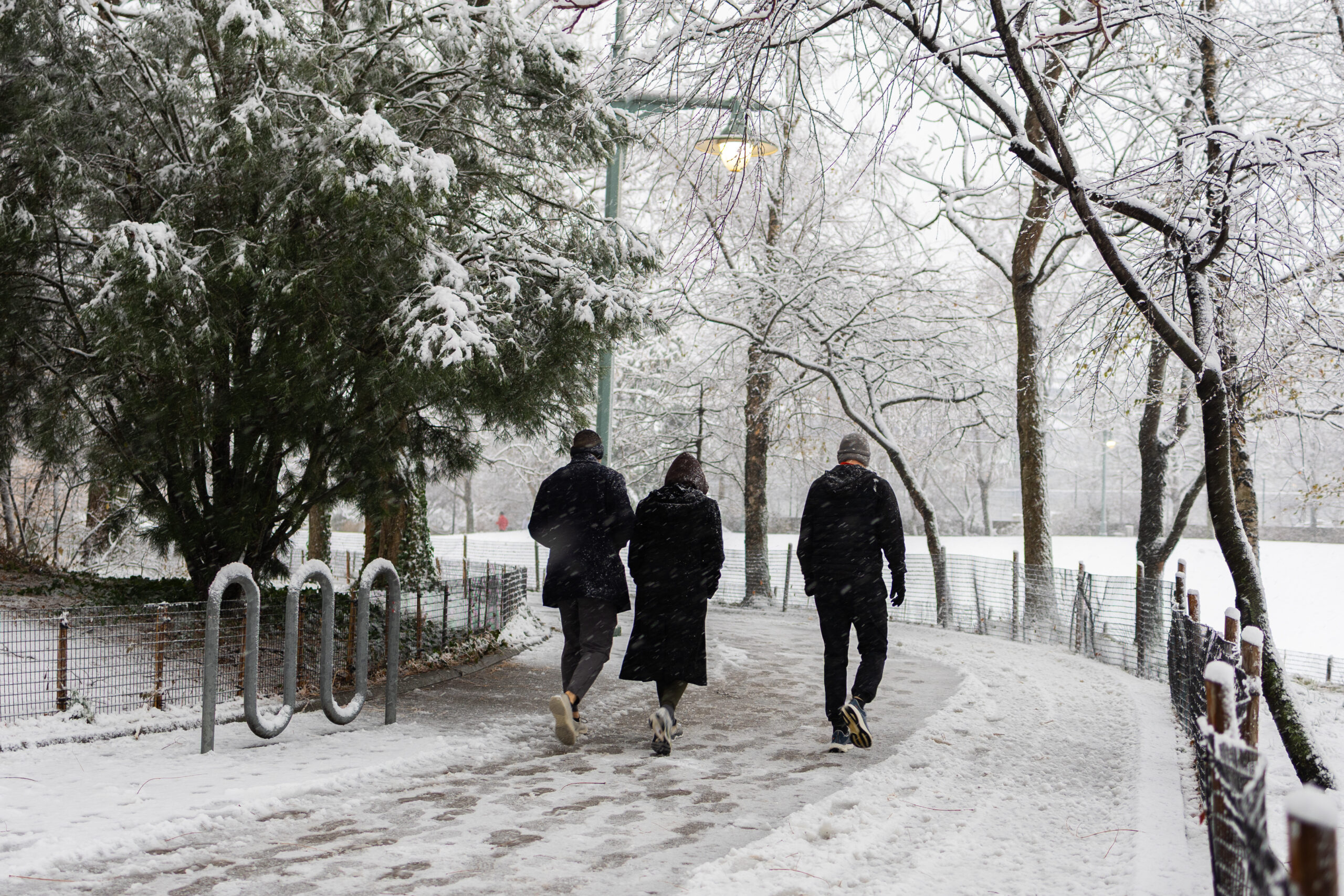 People walking on Park path in snow in Chelsea