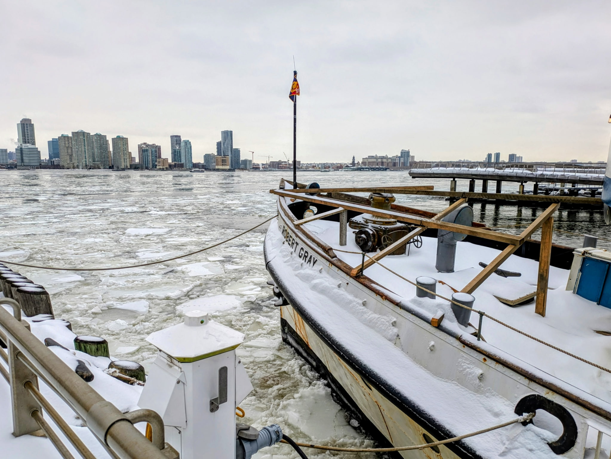 ice floes in the Hudson River with the boat the Robert Gray