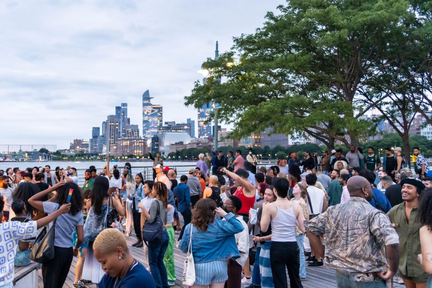 A crowd dances during the Pride Celebration on Pier 45