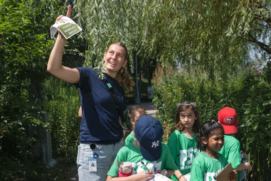 An HRPK River Project staffer leads a class of students on a tour during a Nature Explorers field trip
