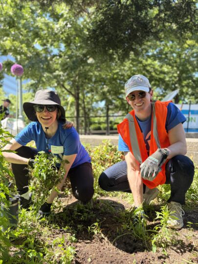 Citi volunteers gardening wearing hats